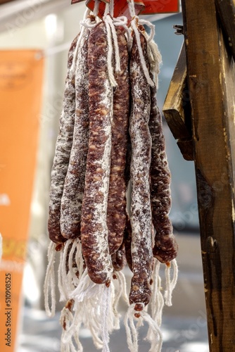 Longaniza, secallona, fuet. Long sausage from Spain, stuffed with minced pork. photo