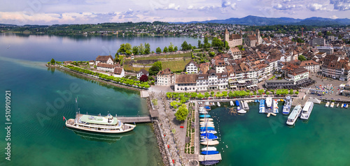 Rapperswil-Jona medieval town and castle on Zurich lake, Switzerland, is a popular tourist destination from Zurich. aerial panoramic view