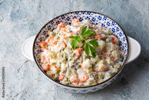 Russian salad Olivier with mayonnaise and egg served (Turkish name; Rus salatasi)