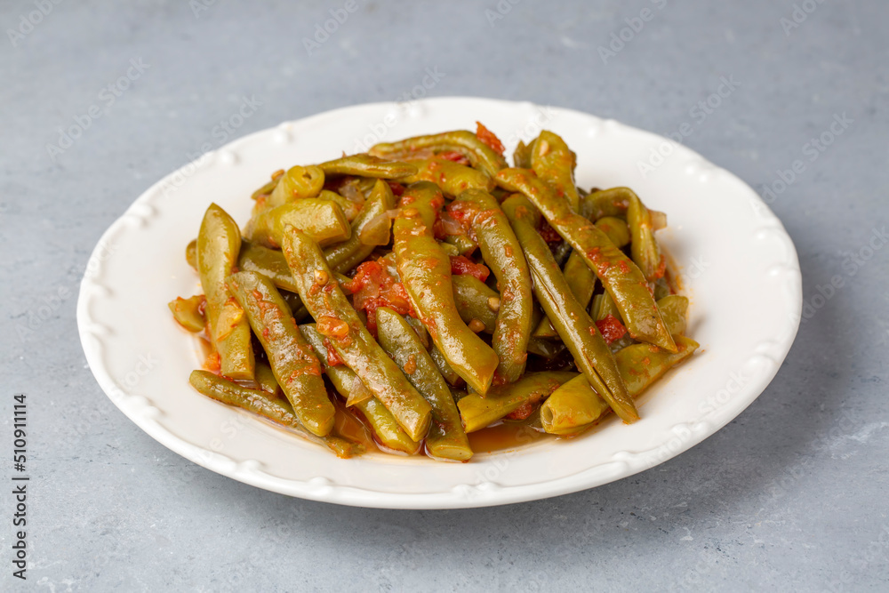 Traditional delicious Turkish food; Green beans with olive oil; Turkish name; Zeytinyagli taze fasulye or zeytinyagli yesil fasulye Traditional delicious Turkish food; Green beans with olive oil; Turkish name; Zeytinyagli taze fasulye or zeytinyagli yesil fasulye
