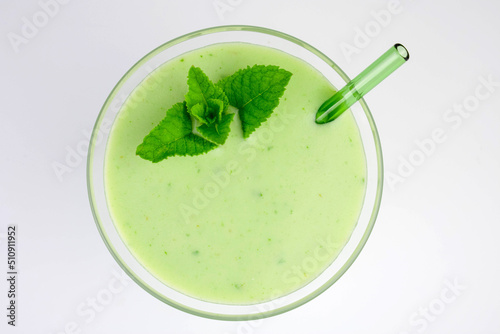 Fresh green mint smoothie isolated on white background. Flat lay. 