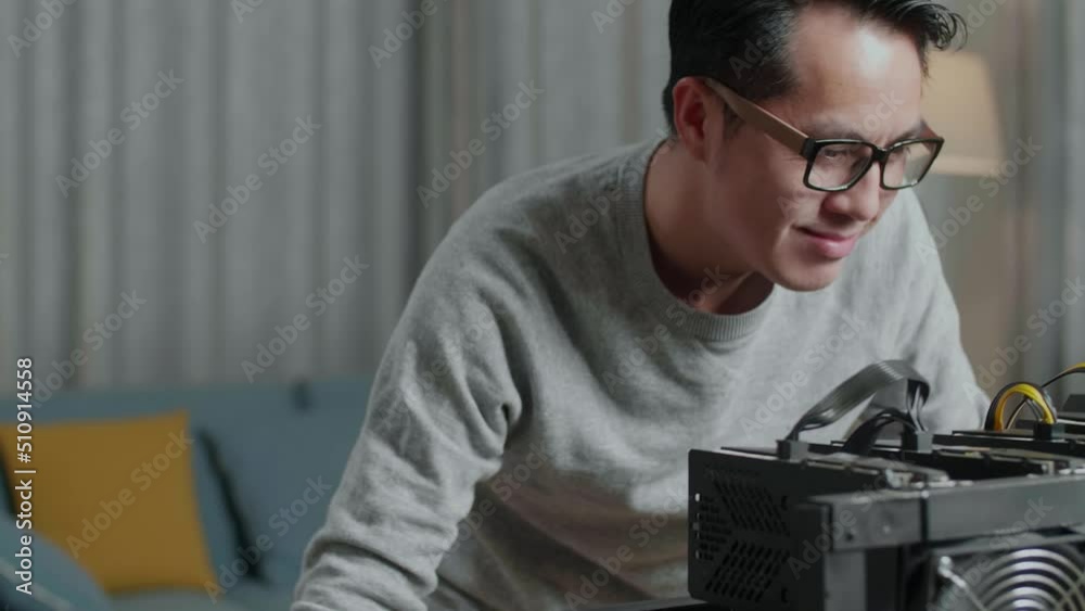Close Up Of Happy Asian Man Celebrating Success With Laptop And Mining Rig For Mining Cryptocurrency
Close Up Of Happy Asian Man Celebrating Success With Laptop And Mining Rig For Mining Cryptocurrency
