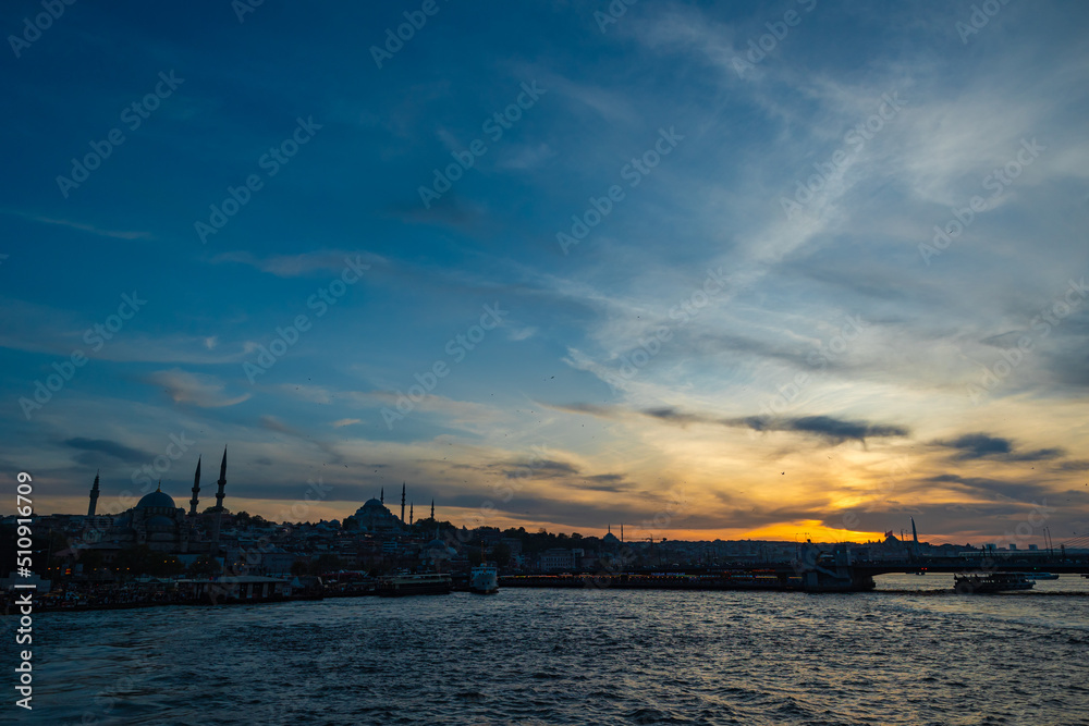 Silhouette of Istanbul at sunset. Suleymaniye Mosque and Eminonu district