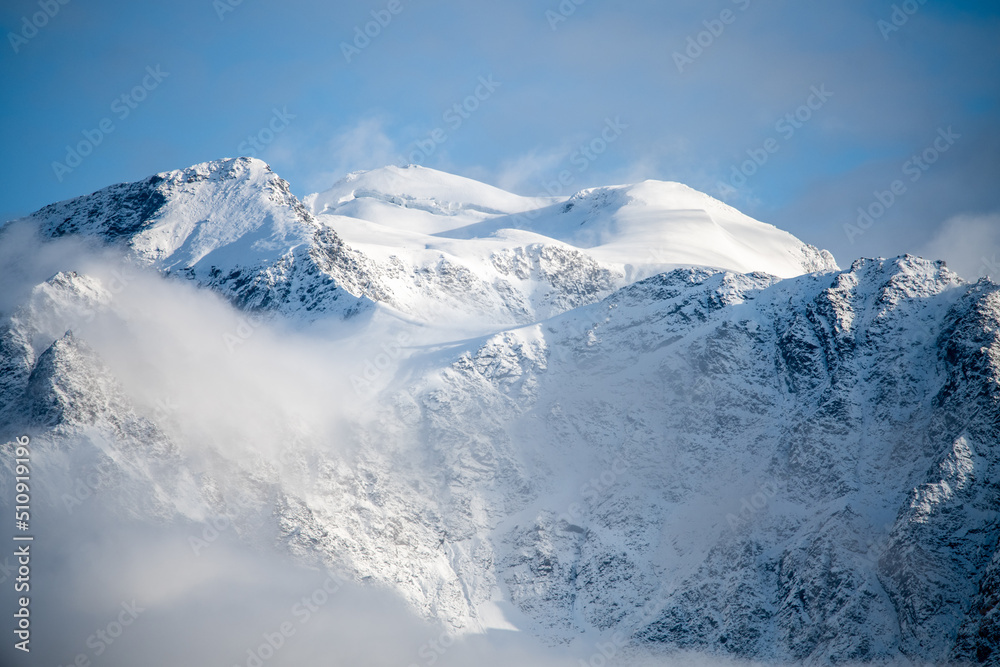 Scenic snow capped mountains landscape in Canada during winter time, late fall. 