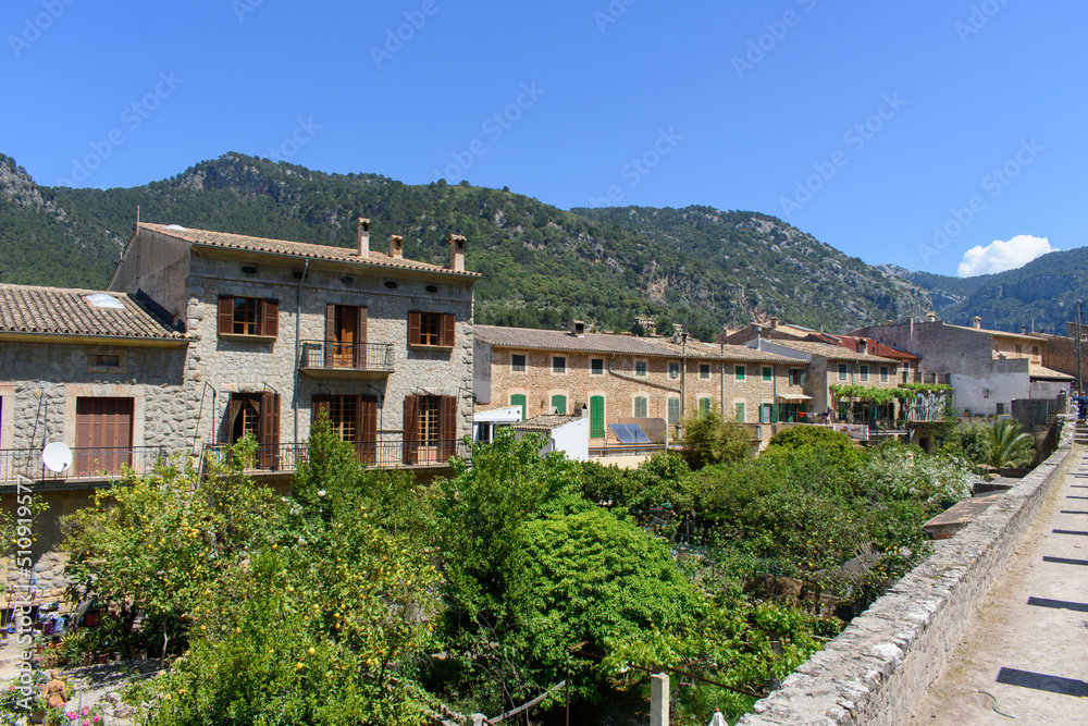 Old houses with mountains in background in Valldemossa, Mallorca