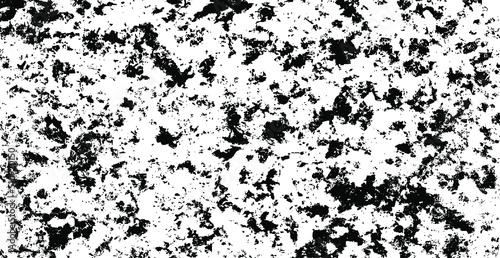 Small uneven spots and particles of debris. Abstract vector texture. Distressed uneven background. Grunge texture overlay with fine grains isolated on white background. Vector illustration. EPS10.