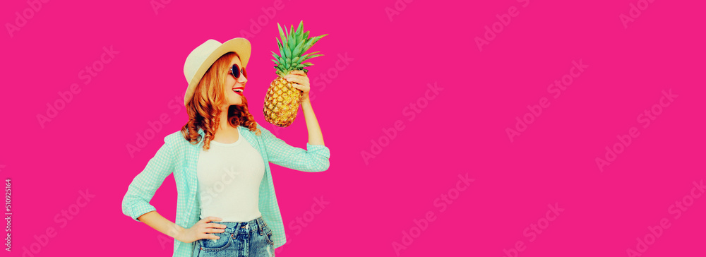 Summer portrait of happy smiling woman with pineapple wearing straw hat, sunglasses on pink background, banner blank copy space for advertising text Summer portrait of happy smiling woman with pineapple wearing straw hat, sunglasses on pink background, banner blank copy space for advertising text