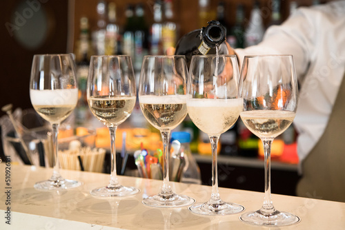 glasses with prosecco on the bar