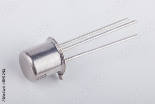 Wallpaper Mural Old metal transistor BC107 on white background. Electronic component. Vintage semiconductor device.  Torontodigital.ca