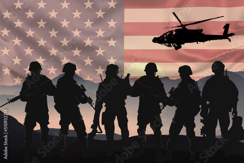 Silhouettes of soldiers with American flag background
