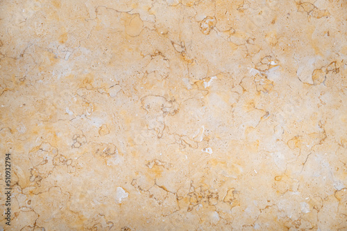 Raw Yellow Marble stone textured surface background.