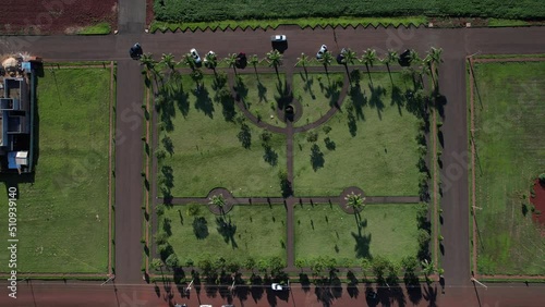 Aerial textures and colors of a plaza or amusement park. Places to exercise and walk. Trees formed linearly in a specific space photo