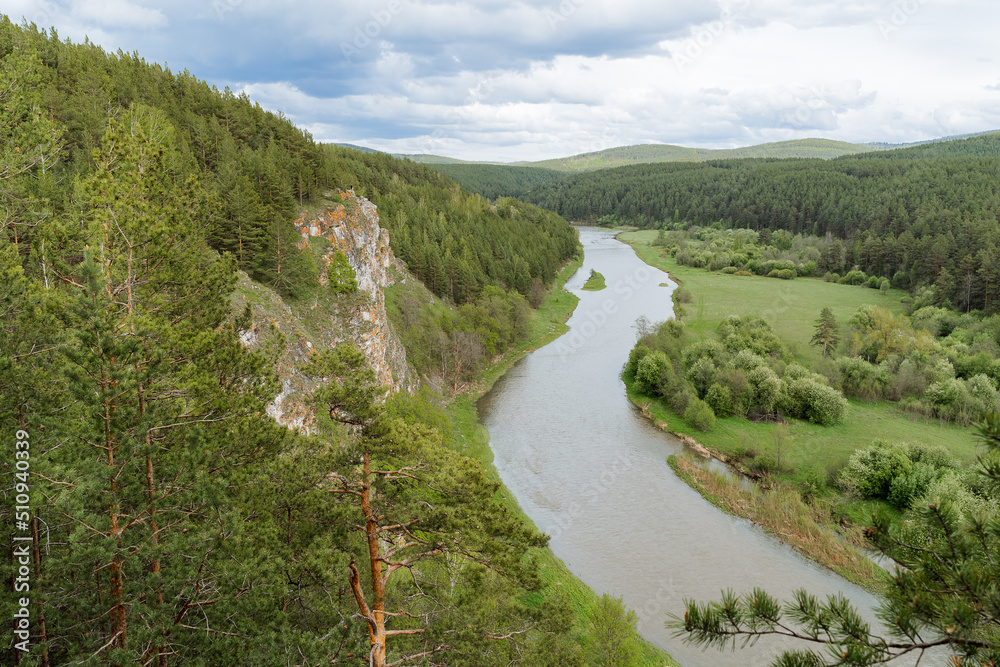 The mountain river flows in Bashkiria, the nature of Russia is the Southern Urals, the beautiful landscape, the Chelyabinsk region, the Rock on the river.