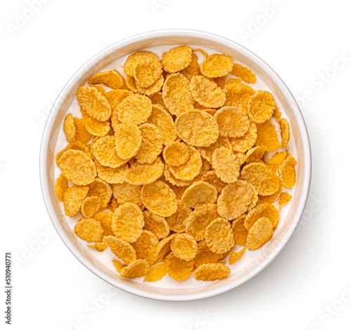 Corn flakes with milk isolated on white, top view photo