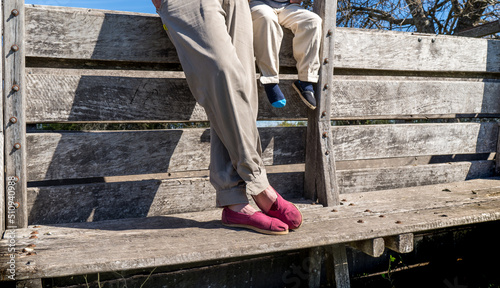 Father and son, with their espadrilles