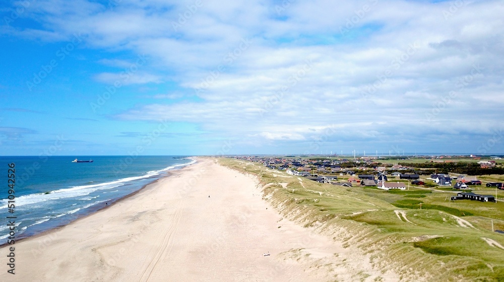 aerial view of the long beach and ocean in jutland near Vrist, harboøre ,lemvig, denmark