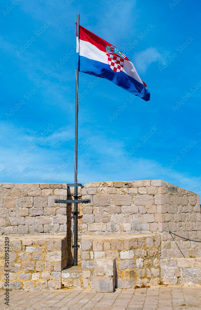 Croatian flag flies over Old Town City Wall