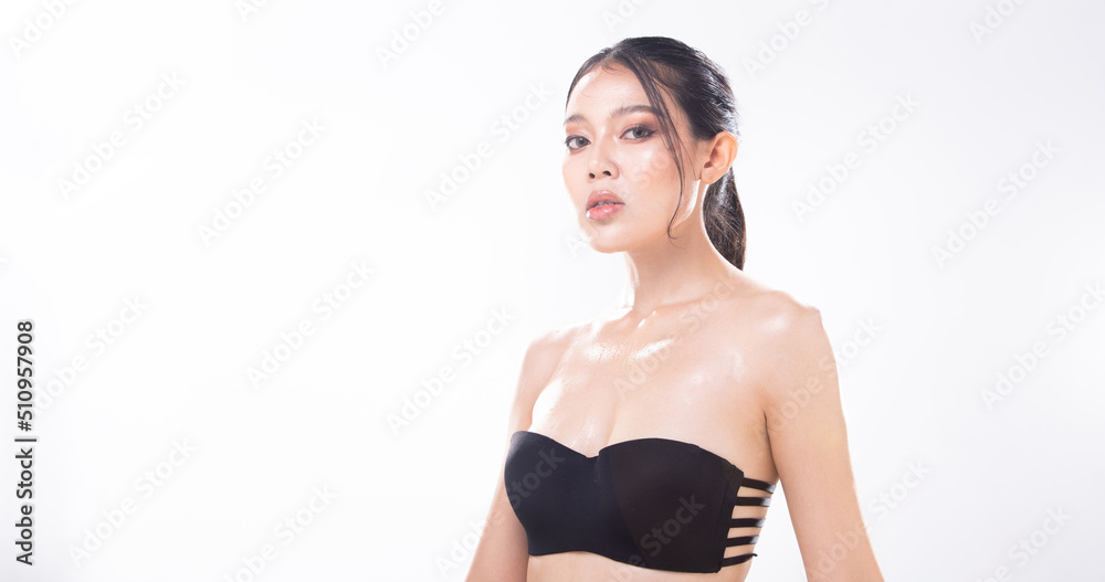 Obraz premium Half Body young adult Asian Woman, look at camera, beautiful Fashion make up open shoulder.