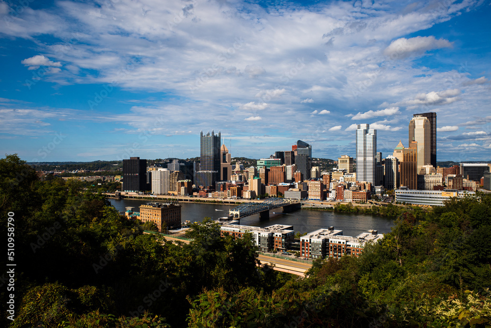 Downtown Pittsburgh, PA, USA, with Monongahela River, saturated colors, sky and clouds.