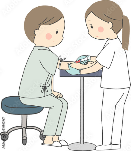 採血をする女性看護師