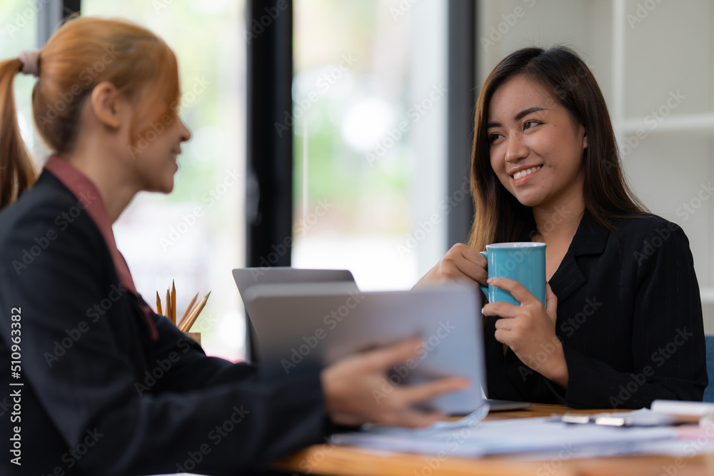 Cheerful business people discussing or brainstorming about marketing plan and financial of company. Account concept. Cheerful business people discussing or brainstorming about marketing plan and financial of company. Account concept.