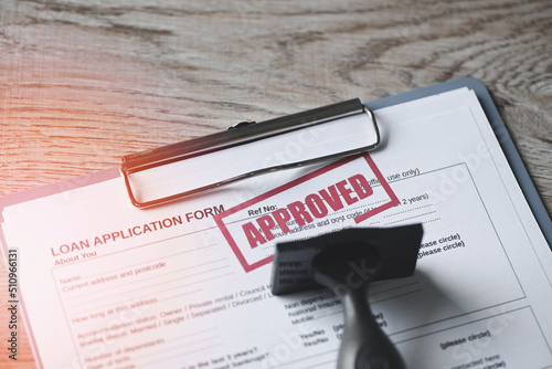Canvas Print Loan approved on loan application form paper with rubber stamp on table, Loan ap