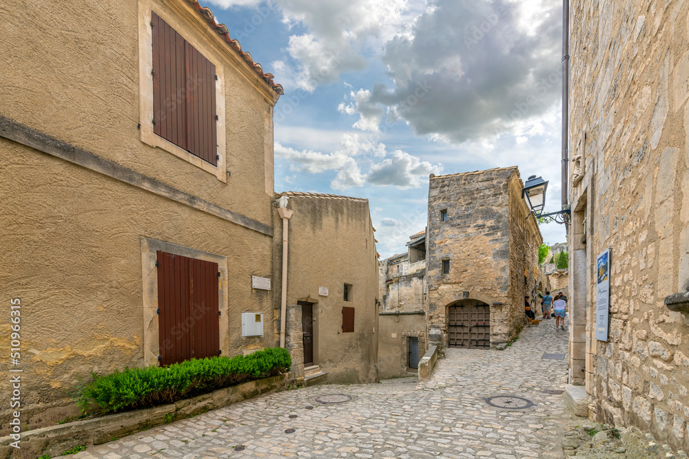 Typical stone street in the medieval old town of Les-Baux-de-Provence in the Alpilles Mountains of the Alpes-Provence region of Southern France.