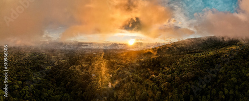 Tableau sur toile Sunset and clouds at a mountain