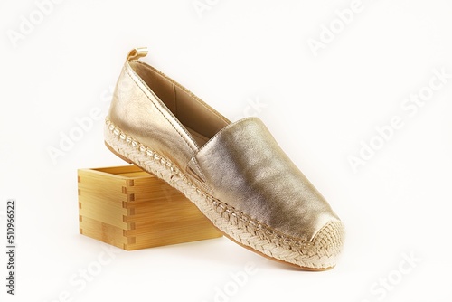 espadrille shoe on wood box