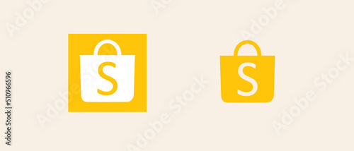 shopping bag sign symbol logo or shopping bag iconvector shopping bag, suitable for shopping app icons, store websites and UI UX icons.Yellow bag icon design with letter S.