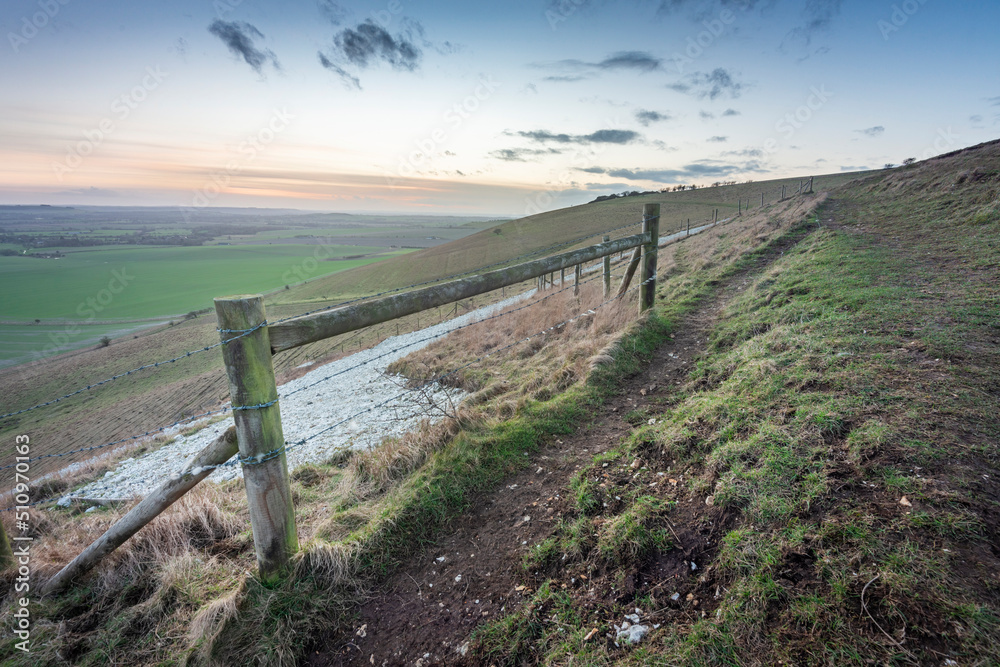 Closeup of section of the Alton Barnes White Horse,and surrounding barbed wire fence,Wiltshire,England,UK.