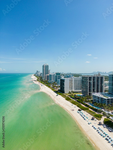 Vertical aerial photo beachfront condos Miami Beach FL near 60th Street © Felix Mizioznikov