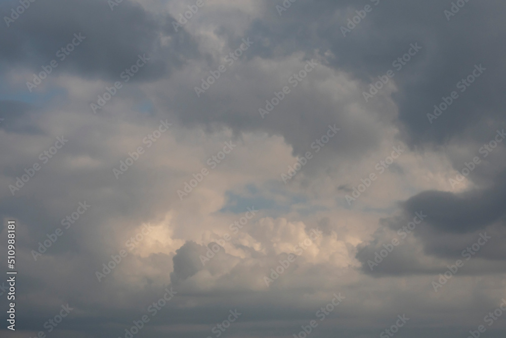 Calm scene with sky full of whit clouds. Abstract nature background for design purpose.