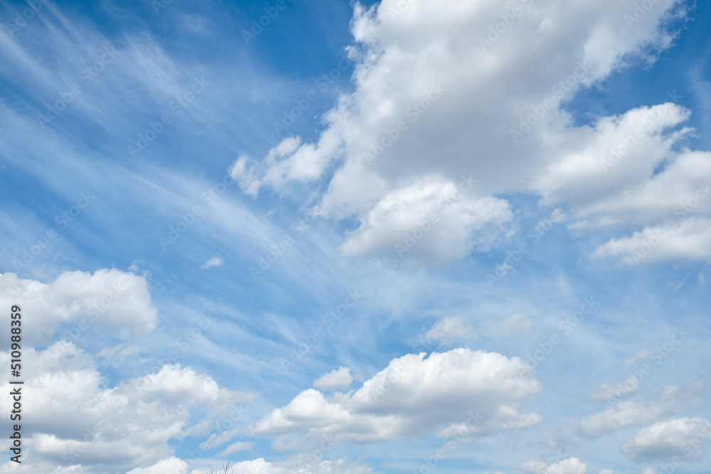 Clear blue sky and white clouds in summer during the daytime Clear blue sky and white clouds in summer during the daytime