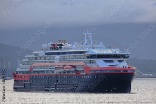 Hurtigruten expedition vessel cruiseship cruise ship liner Roald Amundsen arrival into Port of Vancouver, Canada during early morning sunrise twilight blue hour after Alaska cruising photo