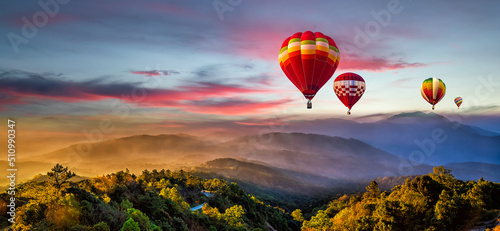 Panorama of balloons, Hot air balloons on the hill in doi inthanon national park , Chiang Mai, Thailand photo