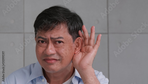 Asian senior man couldn't hear the cause of his deafness.