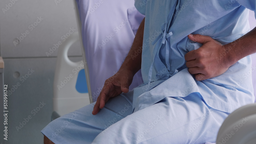  Elderly Asian male patient is hospitalized with stomachache.