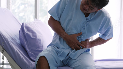  Elderly Asian male patient is hospitalized with stomachache.