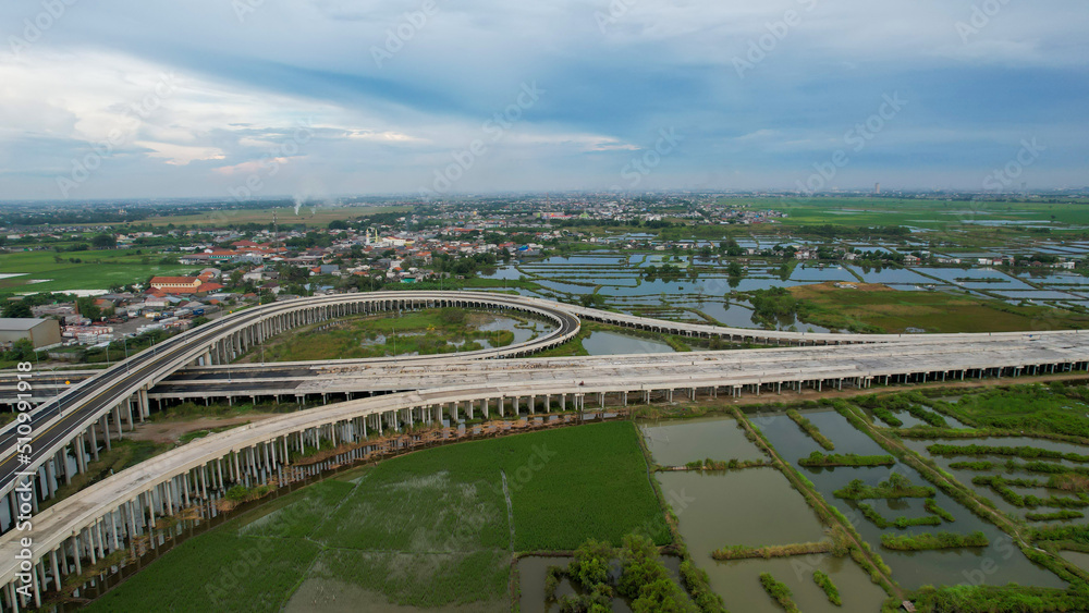 Aerial view on the new road construction site at Tarumajaya Bekasi. 