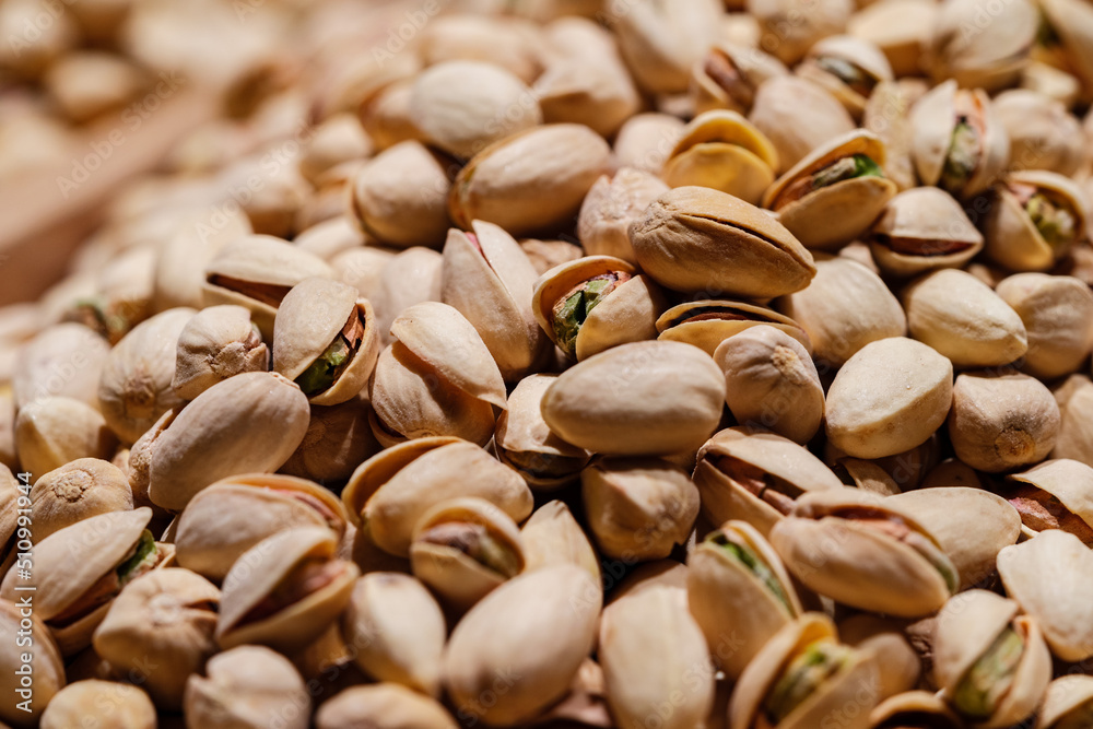 Pistachios nuts texture and background, close up Pistachios nuts texture and background, close up
