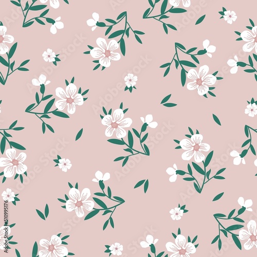 seamless vintage pattern. white flowers and green leaves. light pink background. vector texture. fashionable print for textiles and wallpaper.