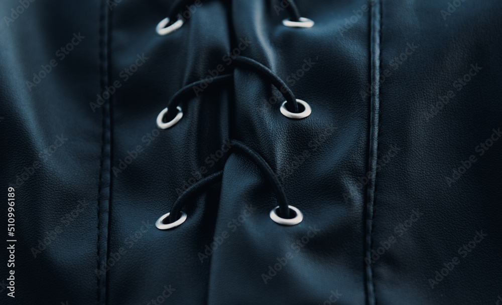 close up of black eco leather with laces