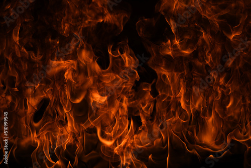 Tablou canvas Blaze burning fire flame on art texture background.