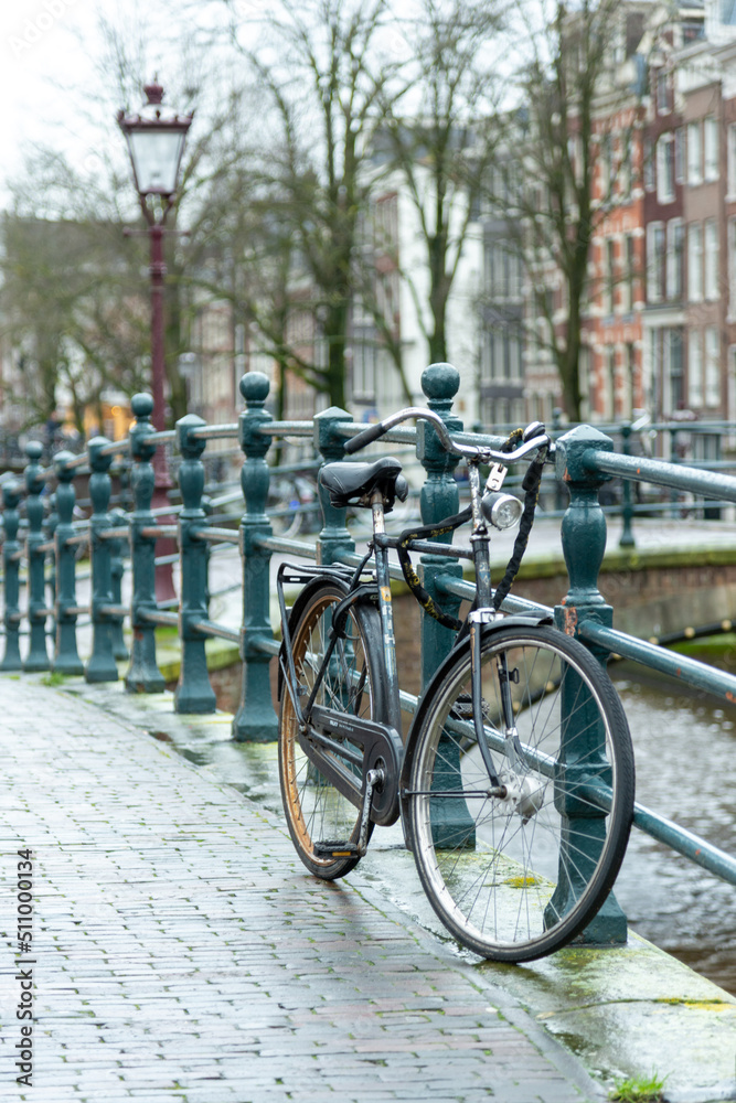 Bike on a railing on Amsterdam