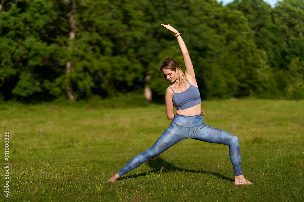 Young woman yoga practitioner in the forest Young woman yoga practitioner in the forest