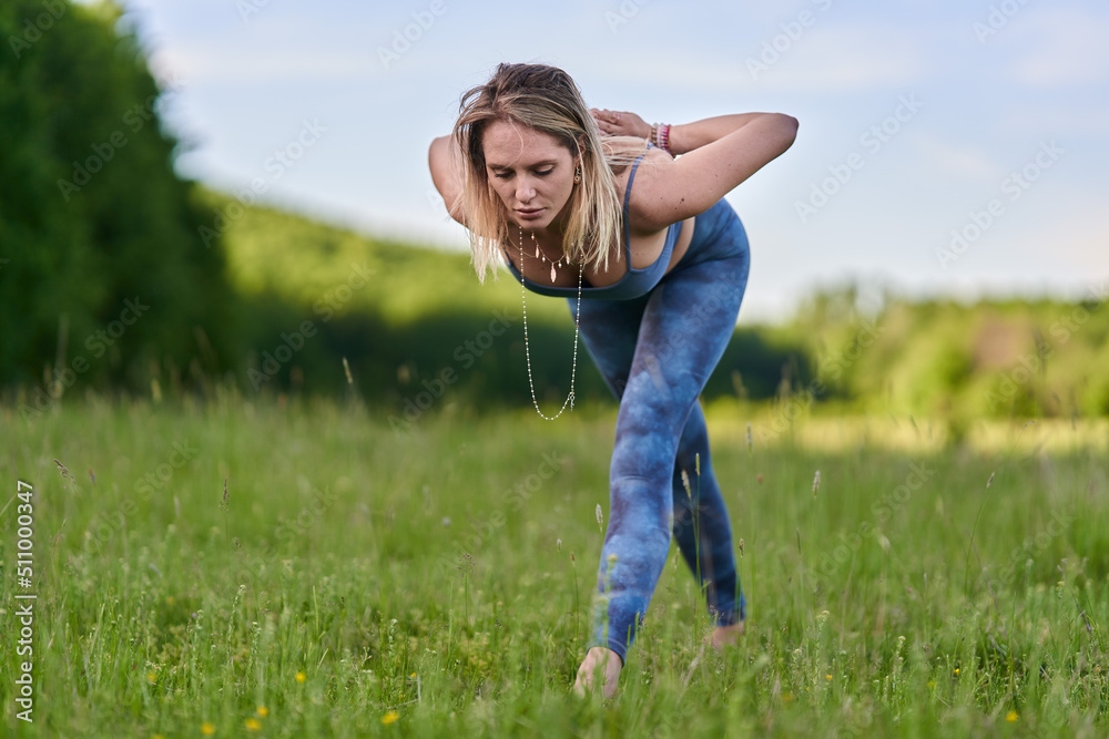 Young woman yoga practitioner in the forest Young woman yoga practitioner in the forest