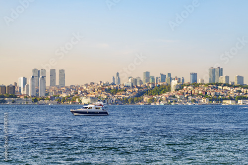 Istanbul skyline. Boat is crossing the Bosporus. © efired