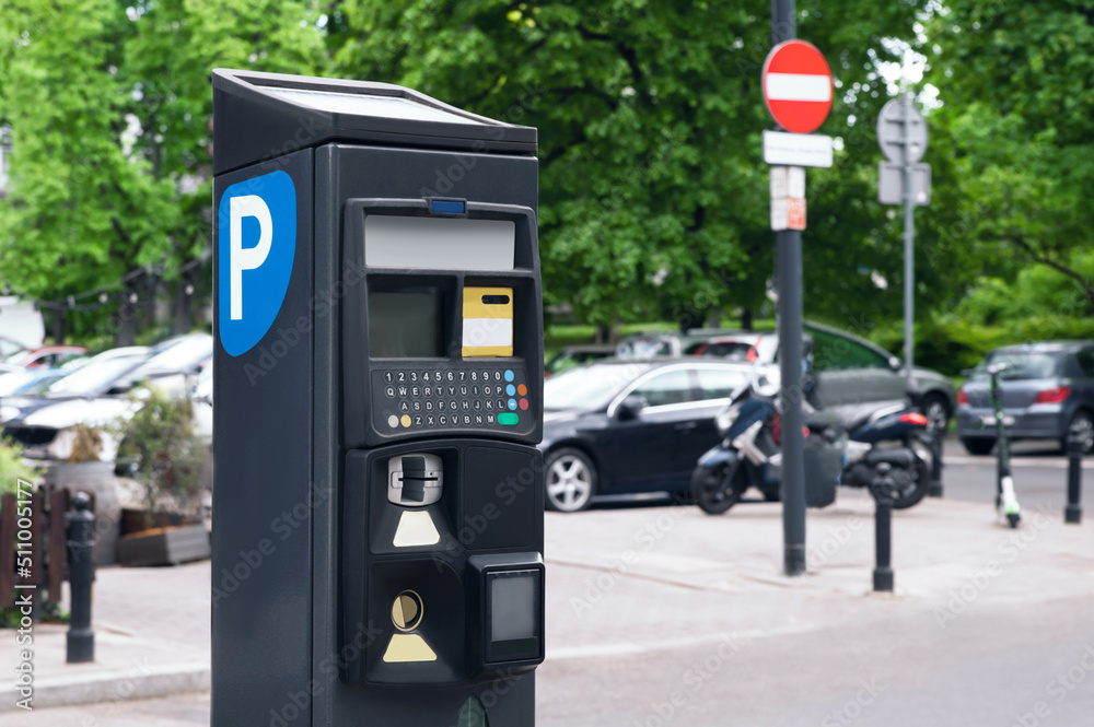Parking meter on city street, space for text. Modern device Parking meter on city street, space for text. Modern device