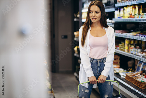 Woman shopping food at grocery store